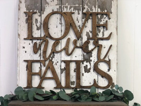 Love Never Fails 1 Corinthians 13:8 Wood Cut Wall Art